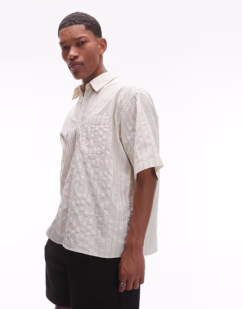 Рубашка свободного кроя ARKET из фактурного хлопка в цвете «добби» белого цвета
Рубашка свободного кроя ARKET из фактурного хлопка в цвете «добби» белого цвета