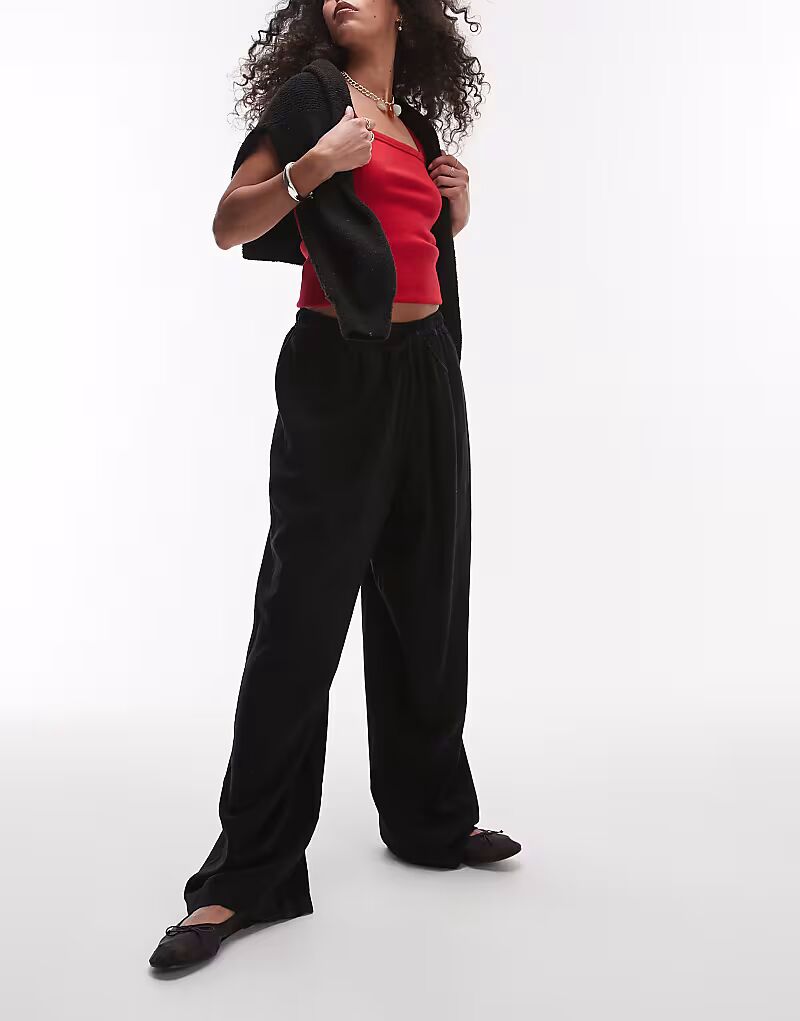 Льняные брюки-баллоны черного цвета Topshop
Льняные брюки-баллоны черного цвета Topshop