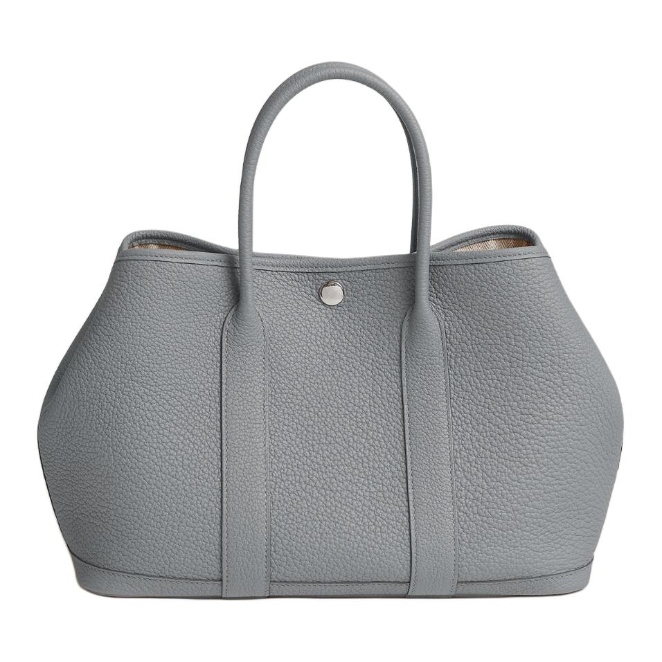 Сумка-торба Garden Party из телячьей кожи Negonda женская P0 Gris Pantin Puppet Gray HERMES
Сумка-торба Garden Party из телячьей кожи Negonda женская P0 Gris Pantin Puppet Gray HERMES