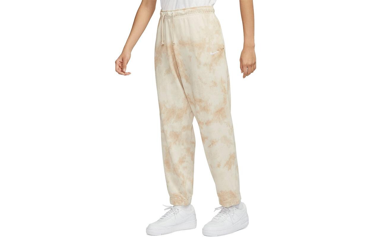 Трикотажные спортивные штаны женские бежевые Nike
Трикотажные спортивные штаны женские бежевые Nike