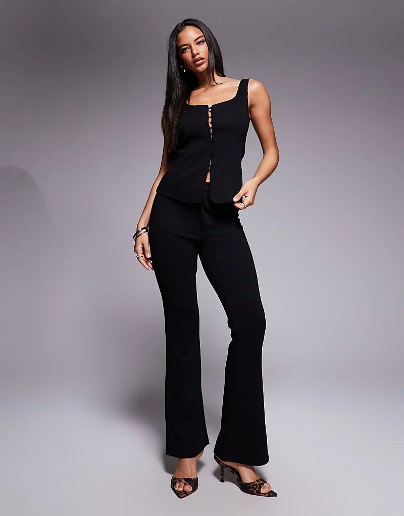 Узкие расклешенные брюки из трикотажного твила ASOS DESIGN черного цвета
Узкие расклешенные брюки из трикотажного твила ASOS DESIGN черного цвета