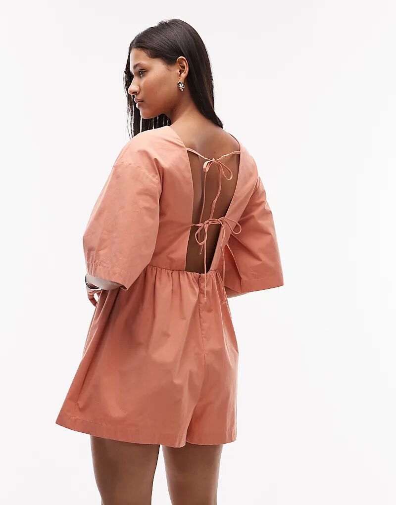 Комбинезон Topshop с глубоким V-образным вырезом оранжевого цвета
Комбинезон Topshop с глубоким V-образным вырезом оранжевого цвета