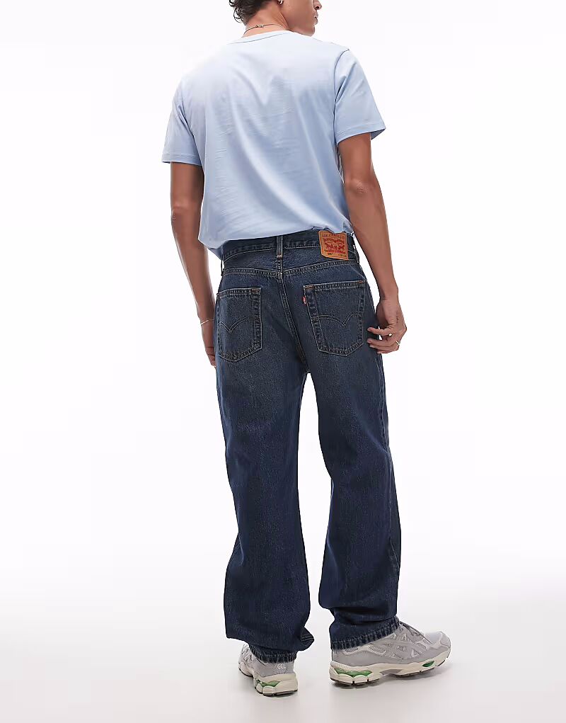 Джинсы Levi's 565 свободного прямого кроя темного цвета
Джинсы Levi's 565 свободного прямого кроя темного цвета