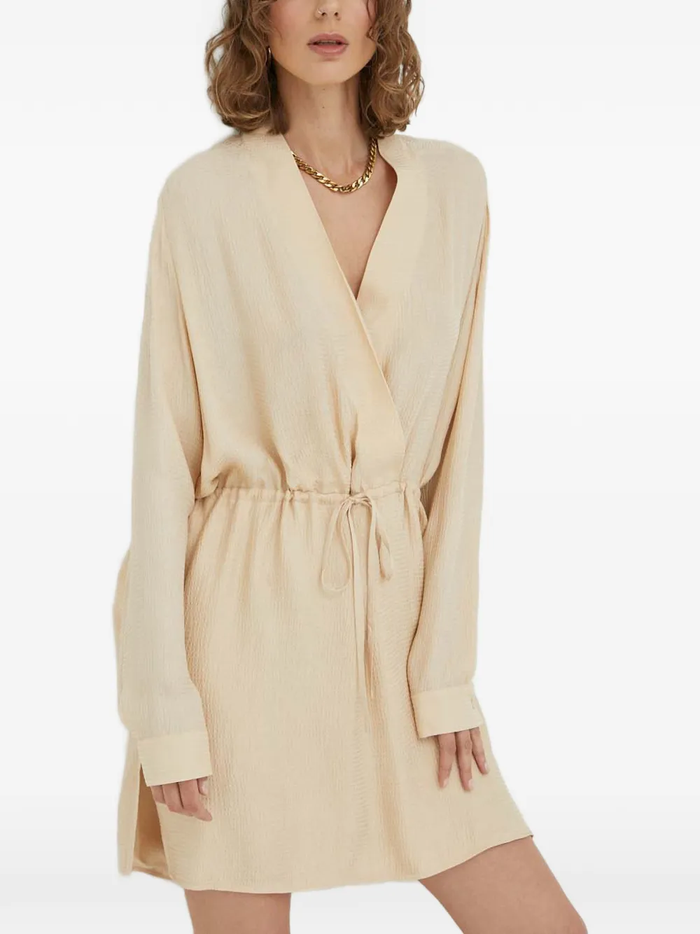 Мини-платье с V-образным вырезом и регулируемой кулиской Herskind, бежевый
Мини-платье с V-образным вырезом и регулируемой кулиской Herskind, бежевый