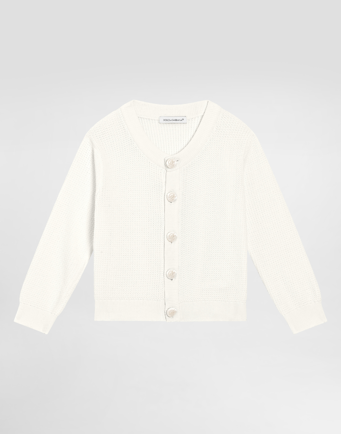 Вязаный кардиган с фирменными пуговицами Dolce&Gabbana, белый
Вязаный кардиган с фирменными пуговицами Dolce&Gabbana, белый