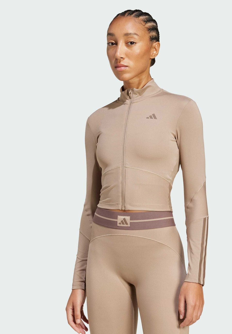 Толстовка Adidas Performance HYPERGLAM COVER UP, Chalky Brown Earth Strata/Brown
Толстовка Adidas Performance HYPERGLAM COVER UP, Chalky Brown Earth Strata/Brown