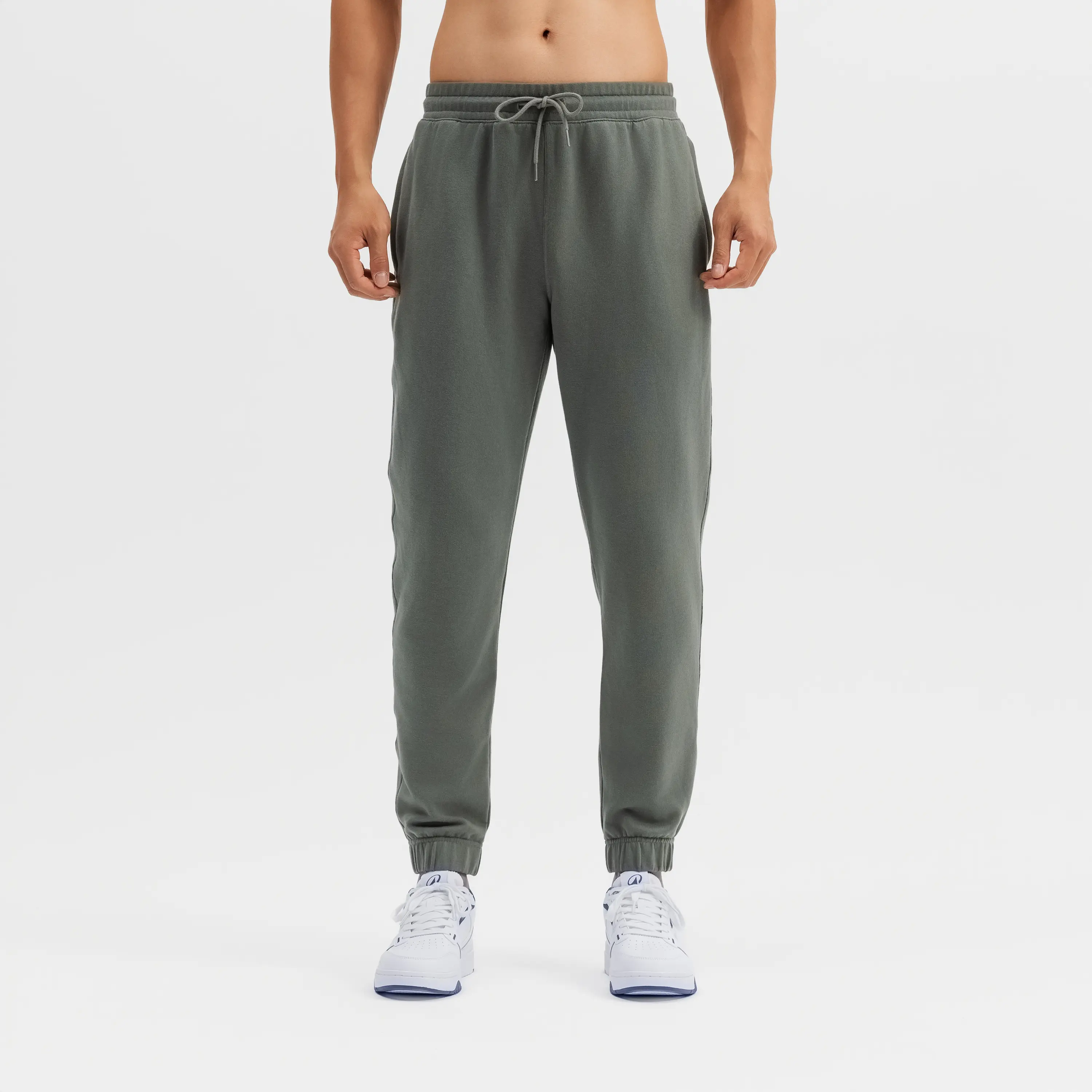 Мужские тренировочные брюки Domyos флисовые зелёные 
Мужские тренировочные брюки Domyos флисовые зелёные