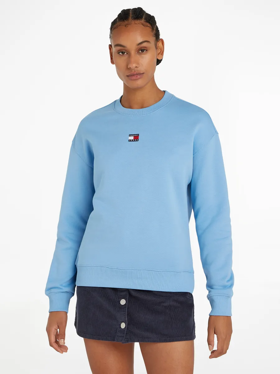 Толстовка Tommy Jeans с заниженными плечами и логотипом спереди, цвет Westside Blue
Толстовка Tommy Jeans с заниженными плечами и логотипом спереди, цвет Westside Blue