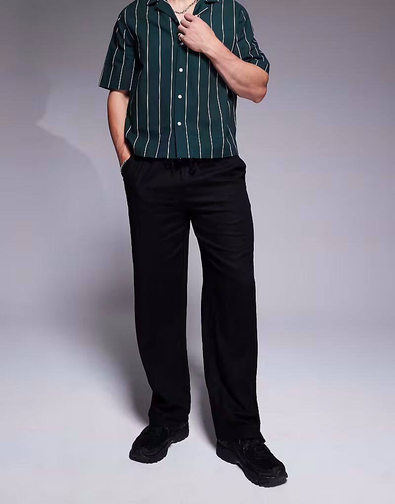 Льняные пляжные брюки черного цвета South Beach
Льняные пляжные брюки черного цвета South Beach