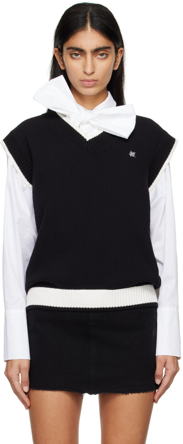 Черный жилет с v-образным вырезом Kimhēkim
Черный жилет с v-образным вырезом Kimhēkim