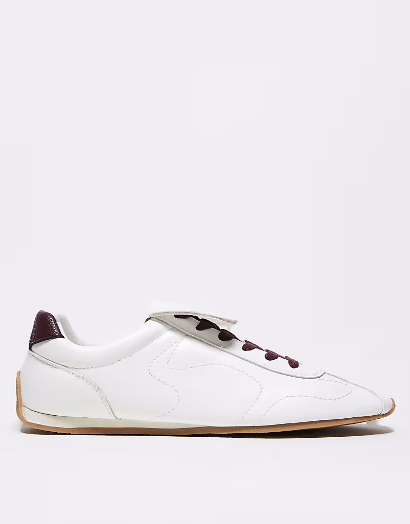 Белые кроссовки ASOS DESIGN в стиле ретро с большим язычком
Белые кроссовки ASOS DESIGN в стиле ретро с большим язычком