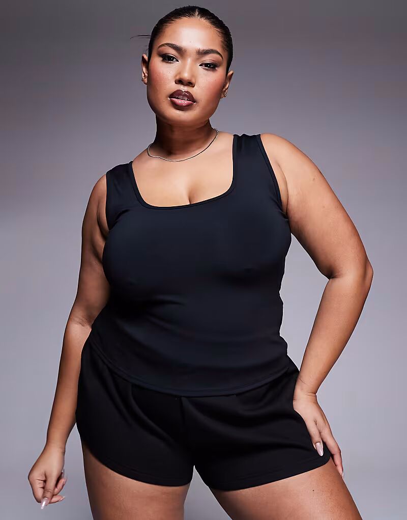 4505 Curve Icon active слегка укороченный топ черного цвета
4505 Curve Icon active слегка укороченный топ черного цвета