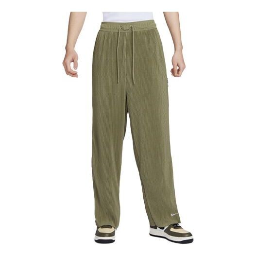 Штаны спортивные около разрывающихся штанов Nike, зеленый
Штаны спортивные около разрывающихся штанов Nike, зеленый