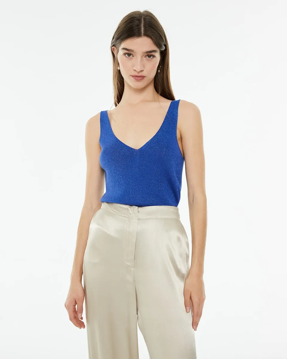 Женский облегающий трикотажный топ с люрексом и блестками System Action, синий
Женский облегающий трикотажный топ с люрексом и блестками System Action, синий