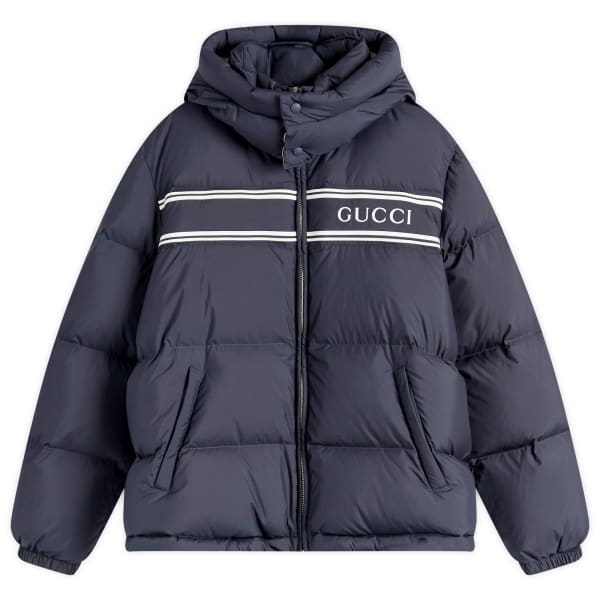 Пуховик с капюшоном и логотипом Gucci, темно-синий
Пуховик с капюшоном и логотипом Gucci, темно-синий