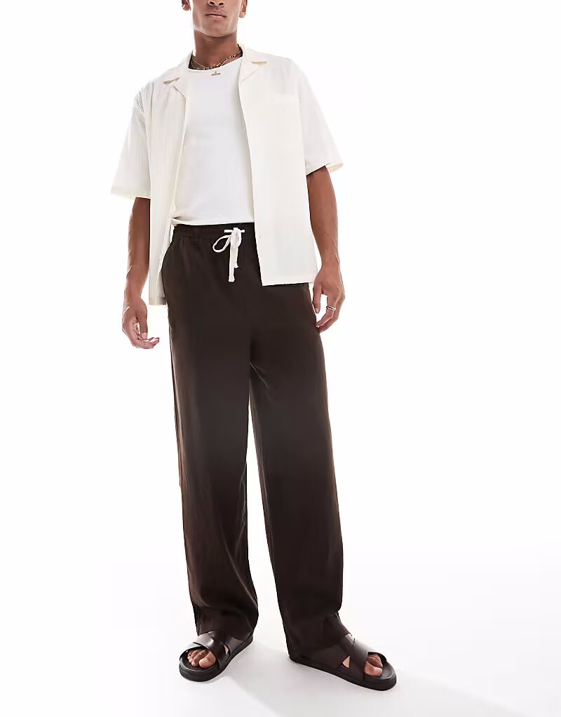 Брюки из потертого льна с контрастной завязкой на талии коричневого цвета Threadbare
Брюки из потертого льна с контрастной завязкой на талии коричневого цвета Threadbare