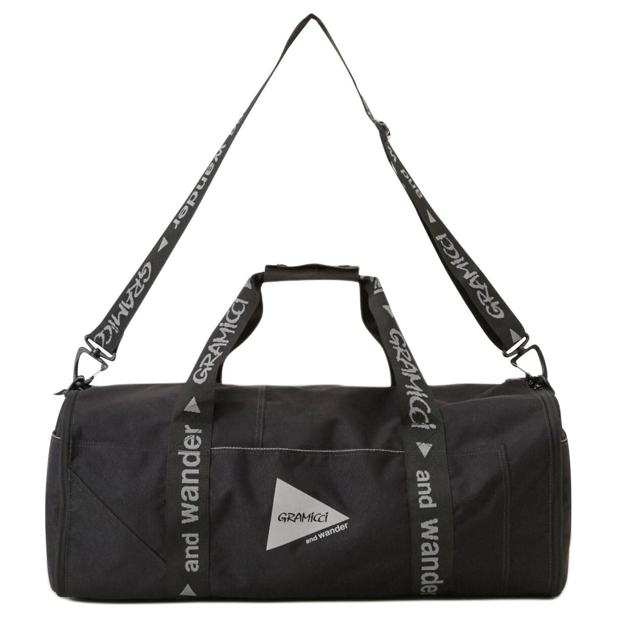 And Wander Полиэстеровая дорожная сумка унисекс черная, Black
And Wander Полиэстеровая дорожная сумка унисекс черная, Black