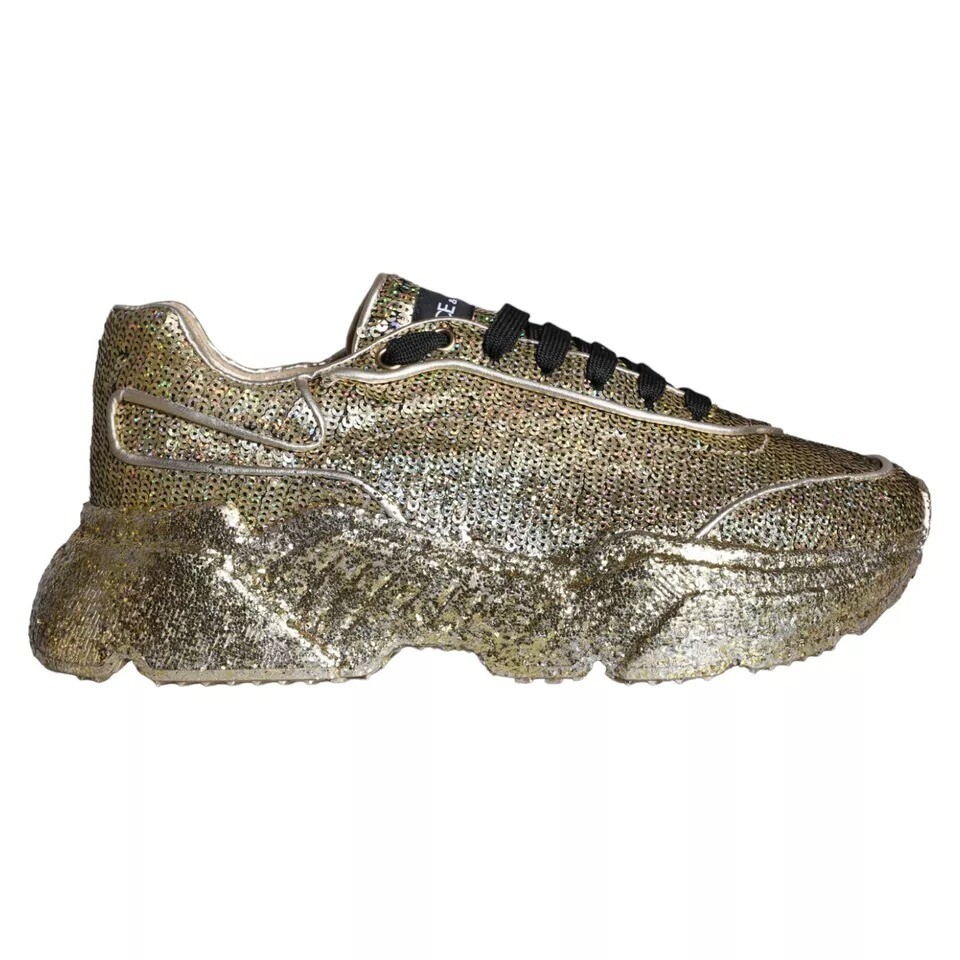 Золотые блестящие кроссовки Daymaster Low Top для мужчин Dolce & Gabbana
Золотые блестящие кроссовки Daymaster Low Top для мужчин Dolce & Gabbana