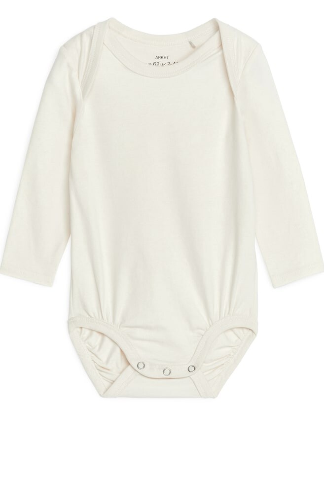 Мягкий хлопковый комбинезон для новорожденных Arket, белый
Мягкий хлопковый комбинезон для новорожденных Arket, белый
