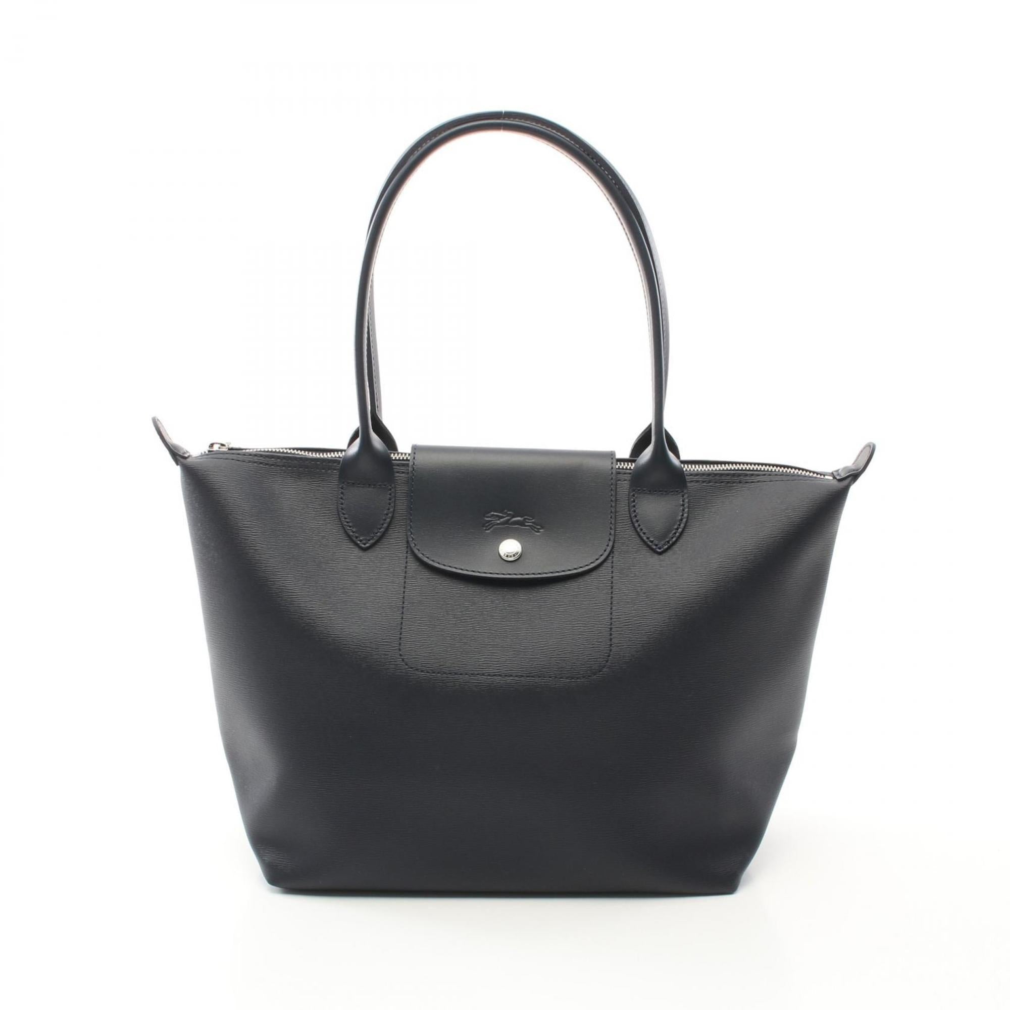 Longchamp Le Pliage Холщовая кожаная сумка-тоут, темно-синий
Longchamp Le Pliage Холщовая кожаная сумка-тоут, темно-синий