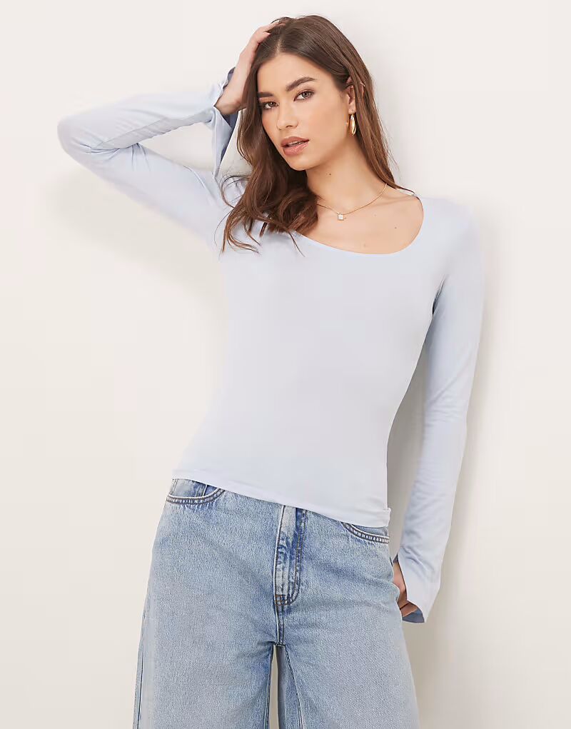 Мягкий на ощупь топ Gina Tricot с длинными рукавами, круглым вырезом и разрезными манжетами синего цвета
Мягкий на ощупь топ Gina Tricot с длинными рукавами, круглым вырезом и разрезными манжетами синего цвета