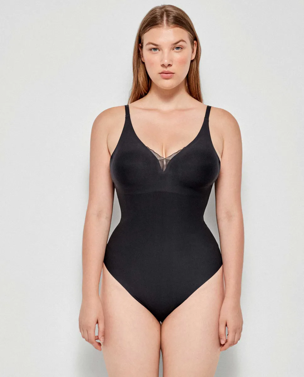 Боди с запахом, без косточек, бесшовное Gisela, черный
Боди с запахом, без косточек, бесшовное Gisela, черный