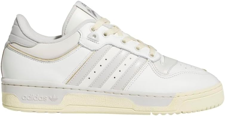 Мужские кроссовки adidas Rivalry Low Adidas Originals, слоновая кость/белый/серый
Мужские кроссовки adidas Rivalry Low Adidas Originals, слоновая кость/белый/серый