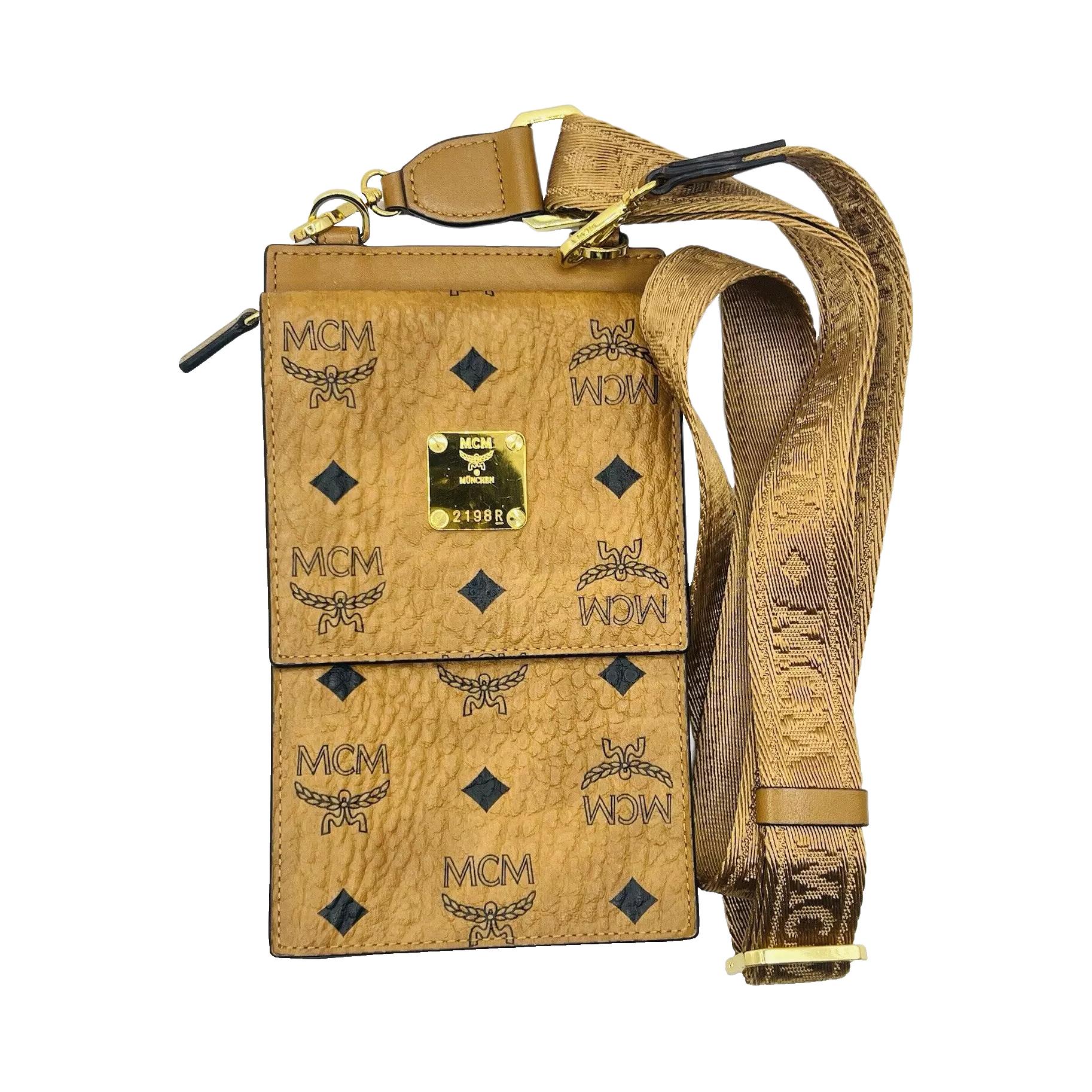 MCM Вискозный искусственный кожаный картхолдер унисекс коричневый коньяк
MCM Вискозный искусственный кожаный картхолдер унисекс коричневый коньяк