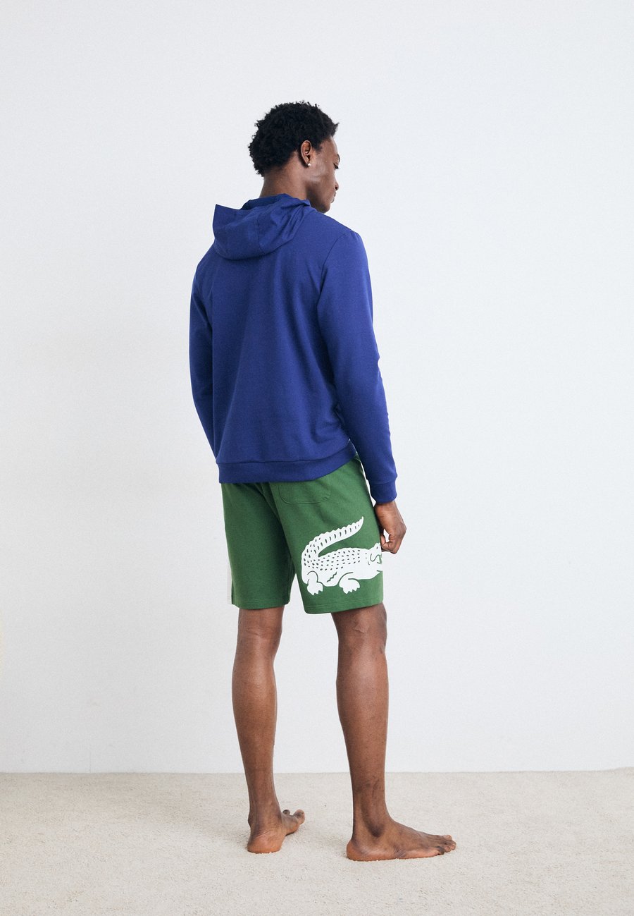 Пижамные брюки Lacoste Pyjama bottoms, Thyme/Navy Blue/White/Dark Green
Пижамные брюки Lacoste Pyjama bottoms, Thyme/Navy Blue/White/Dark Green