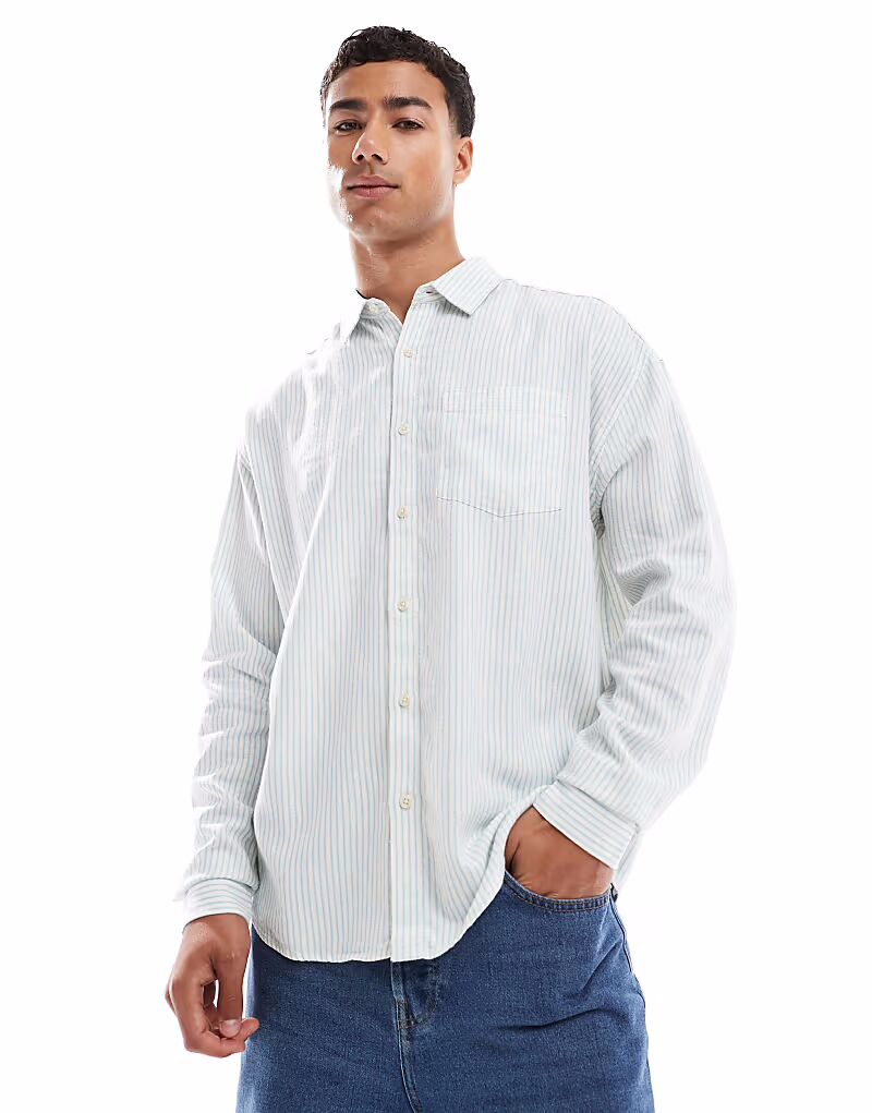 Рубашка New Look с длинными рукавами из льняной смеси в каменном цвете
Рубашка New Look с длинными рукавами из льняной смеси в каменном цвете