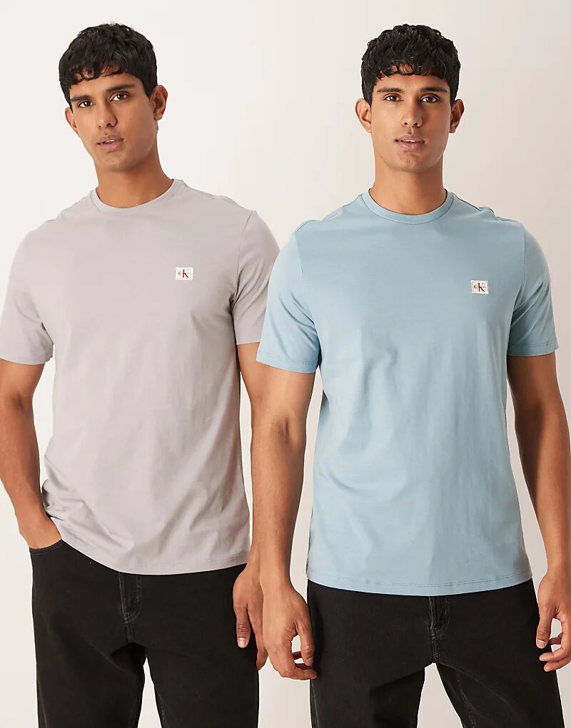 Набор из двух футболок с эмблемой Calvin Klein Jeans серого и синего цветов
Набор из двух футболок с эмблемой Calvin Klein Jeans серого и синего цветов