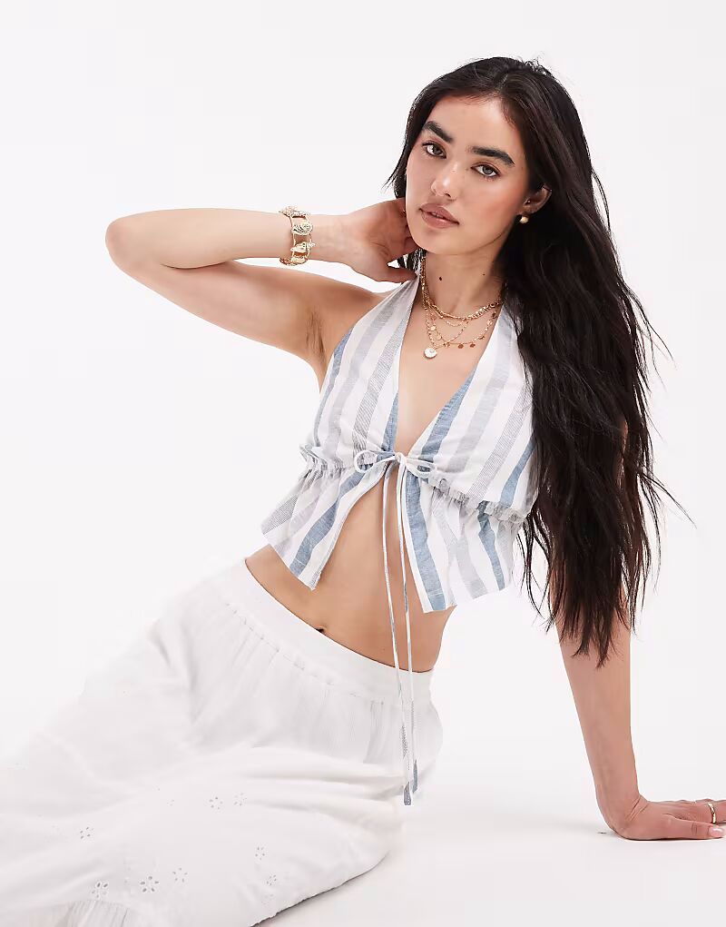 Топ-халтер Wednesday's Girl в смелую полоску синего цвета
Топ-халтер Wednesday's Girl в смелую полоску синего цвета