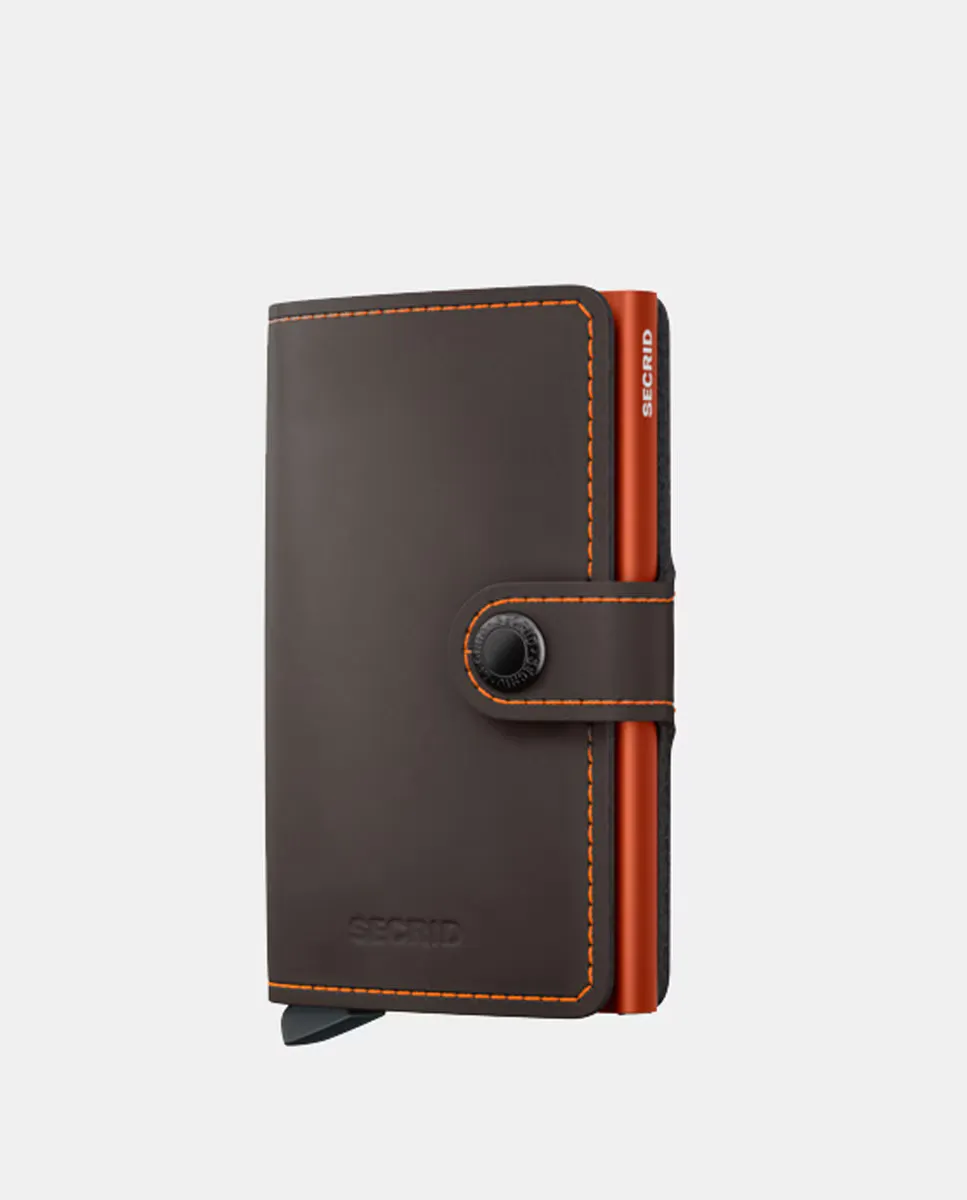 Визитница из матовой кожи трюфельного цвета с оранжевым протектором и защитой RFID Secrid, коричневый
Визитница из матовой кожи трюфельного цвета с оранжевым протектором и защитой RFID Secrid, коричневый