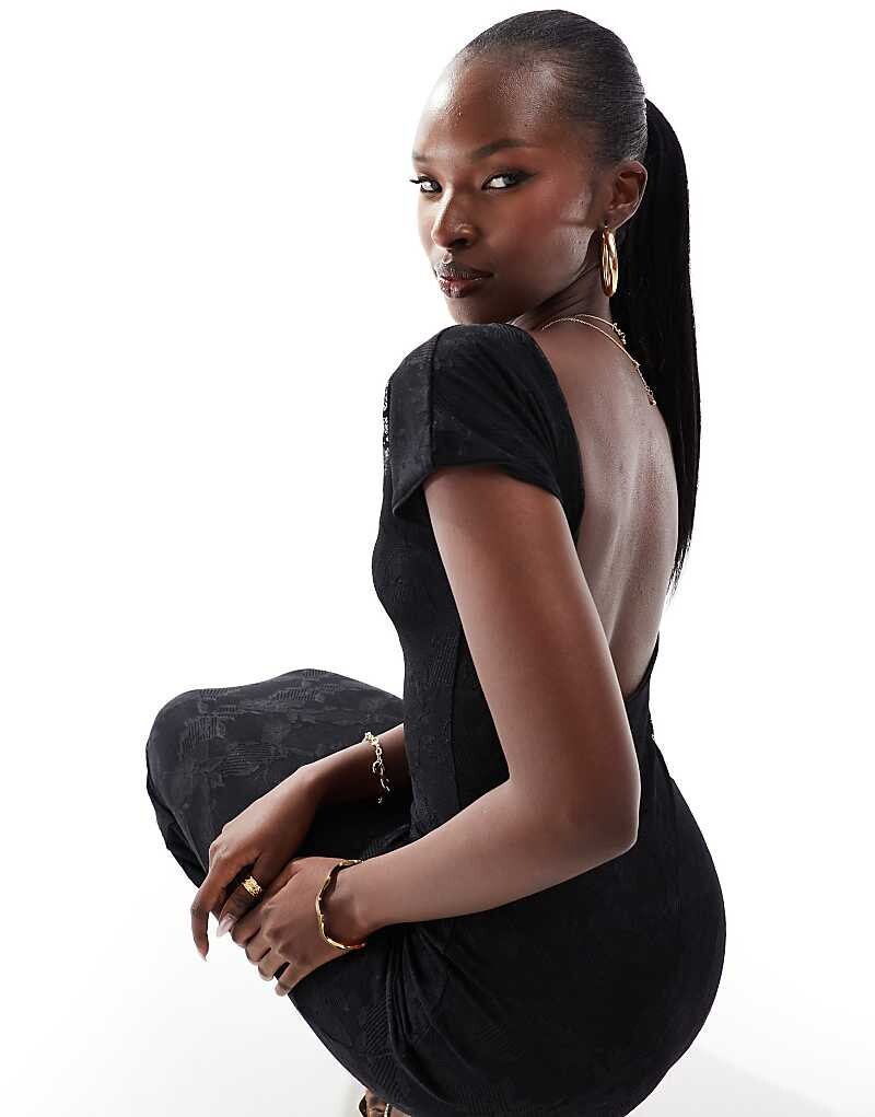 Эксклюзивное черное кружевное облегающее платье макси с низкой спинкой и рукавами Kaiia
Эксклюзивное черное кружевное облегающее платье макси с низкой спинкой и рукавами Kaiia