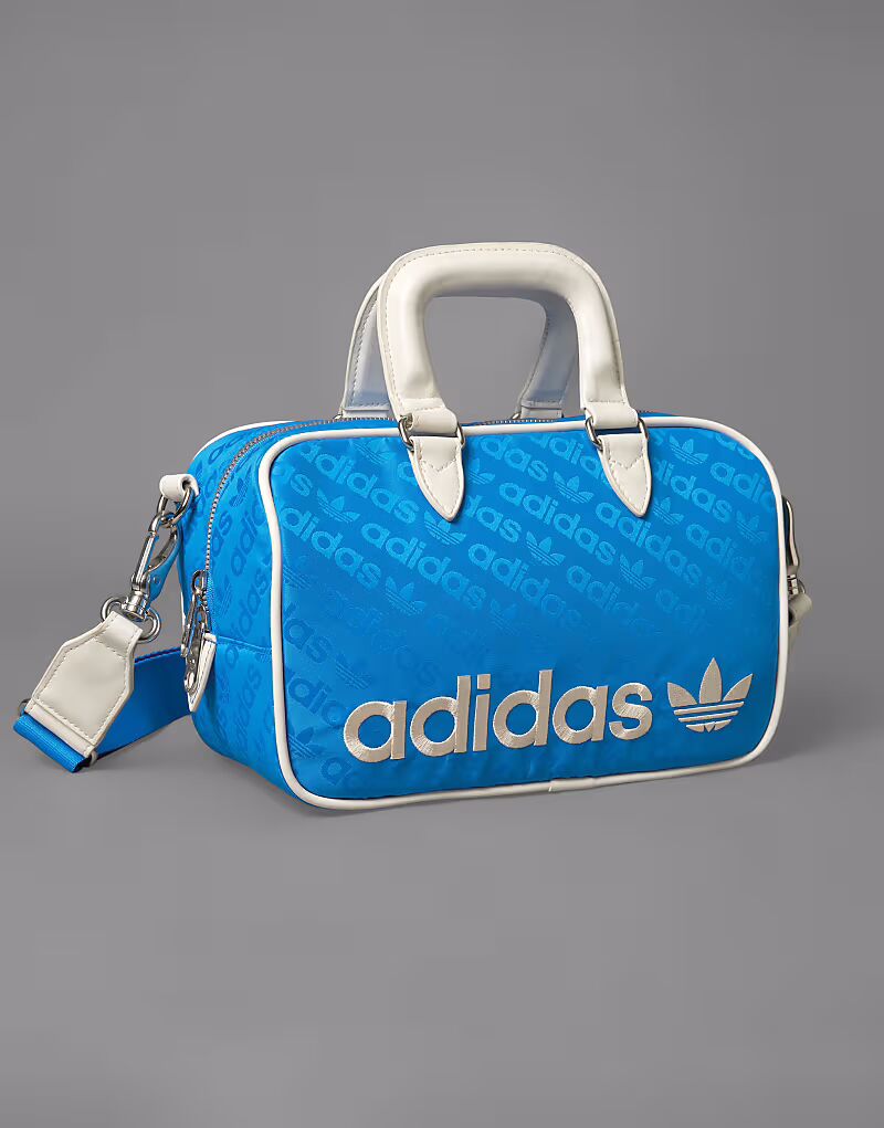 Круглая сумка для гольфа Adidas Originals в синем и белом цветах Adidas Performance
Круглая сумка для гольфа Adidas Originals в синем и белом цветах Adidas Performance