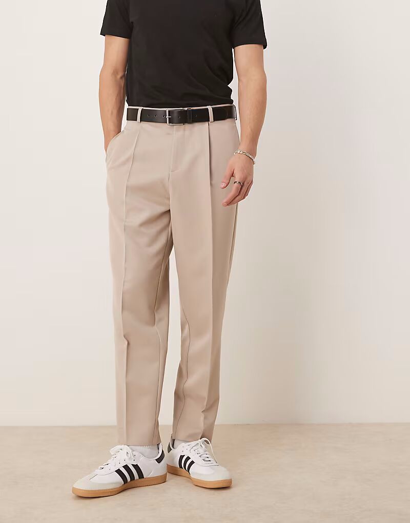 ASOS DESIGN элегантные свободные зауженные брюки со складкой спереди в каменном цвете
ASOS DESIGN элегантные свободные зауженные брюки со складкой спереди в каменном цвете