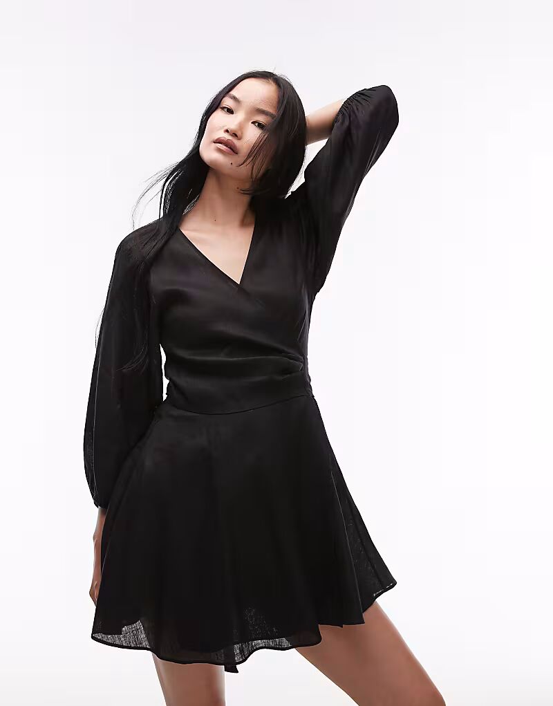 & Other Stories льняное мини-платье с запахом спереди и рукавами-буфами черного цвета
& Other Stories льняное мини-платье с запахом спереди и рукавами-буфами черного цвета