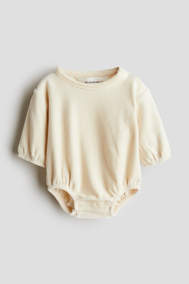 Комбинезон из хлопкового велюра H&M, бежевый
Комбинезон из хлопкового велюра H&M, бежевый