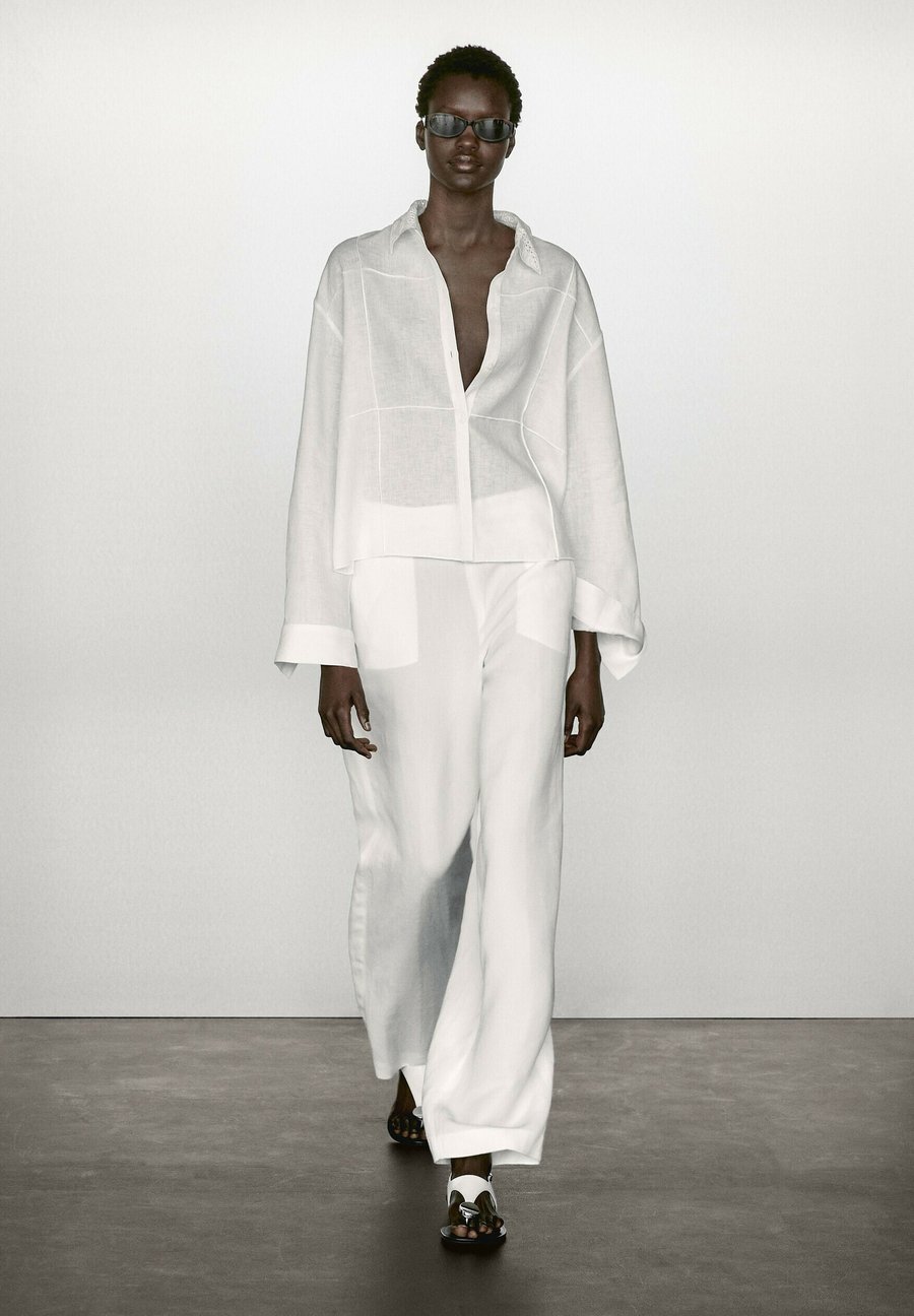 Блуза Massimo Dutti GARMENT WITH EMBROIDERED DETAIL, White
Блуза Massimo Dutti GARMENT WITH EMBROIDERED DETAIL, White