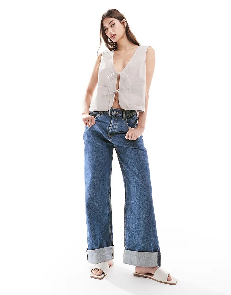 Свободные джинсы с глубокими отворотами, средне-синего цвета ASOS DESIGN
Свободные джинсы с глубокими отворотами, средне-синего цвета ASOS DESIGN