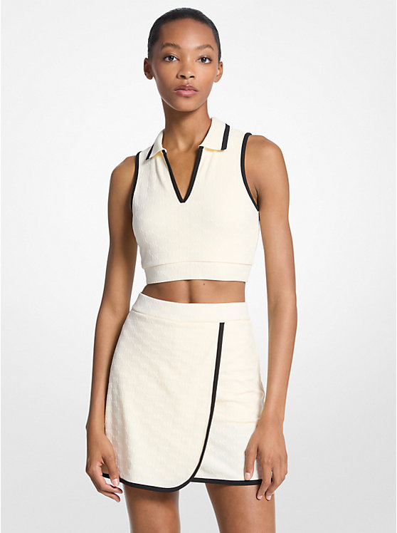 Укороченный топ из жаккардовой ткани с логотипом Michael Kors, белый
Укороченный топ из жаккардовой ткани с логотипом Michael Kors, белый