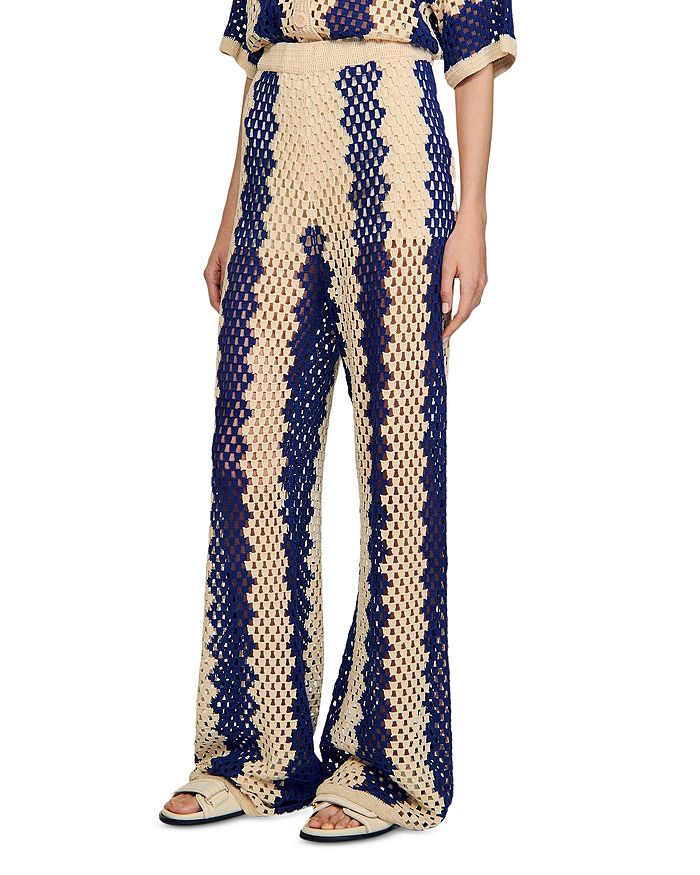 Двухцветные брюки с ажурной вязкой Sandro, мультиколор
Двухцветные брюки с ажурной вязкой Sandro, мультиколор