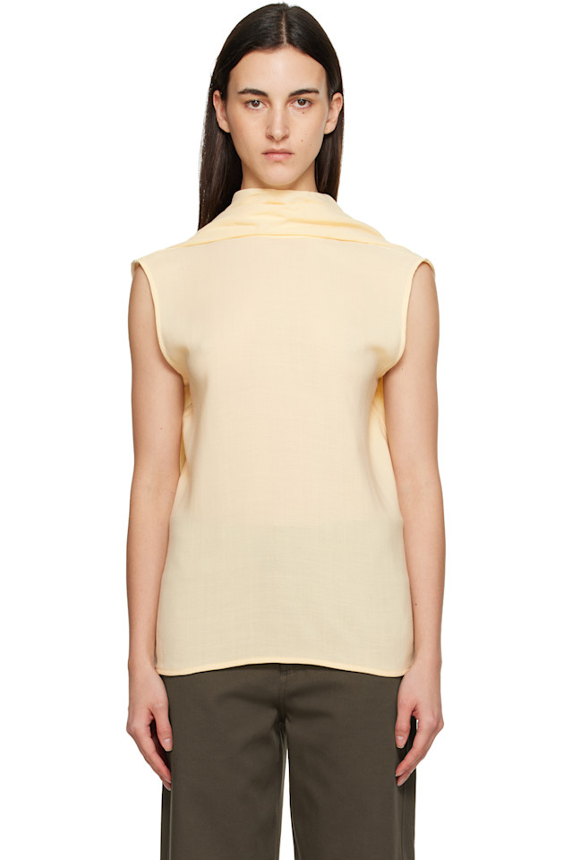 Toteme Желтая блузка-накидка в виде кокона
Toteme Желтая блузка-накидка в виде кокона