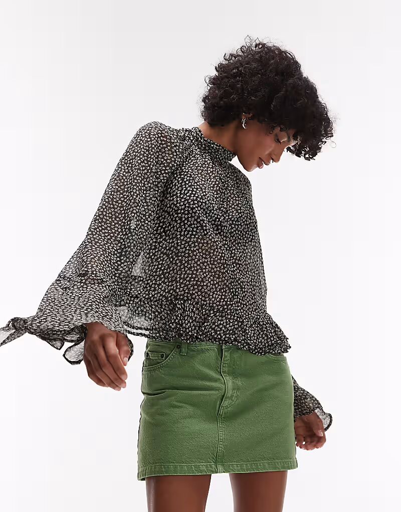 Блузка с принтом в виде флейты на рукавах Mango черного цвета
Блузка с принтом в виде флейты на рукавах Mango черного цвета