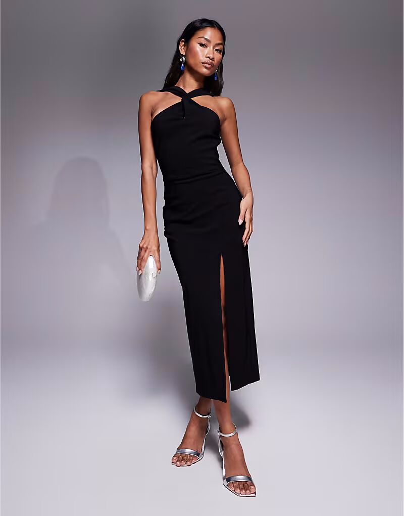 Платье мидакси Vesper bengaline с закрученным спереди халтер-воротником и боковыми разрезами черного цвета
Платье мидакси Vesper bengaline с закрученным спереди халтер-воротником и боковыми разрезами черного цвета