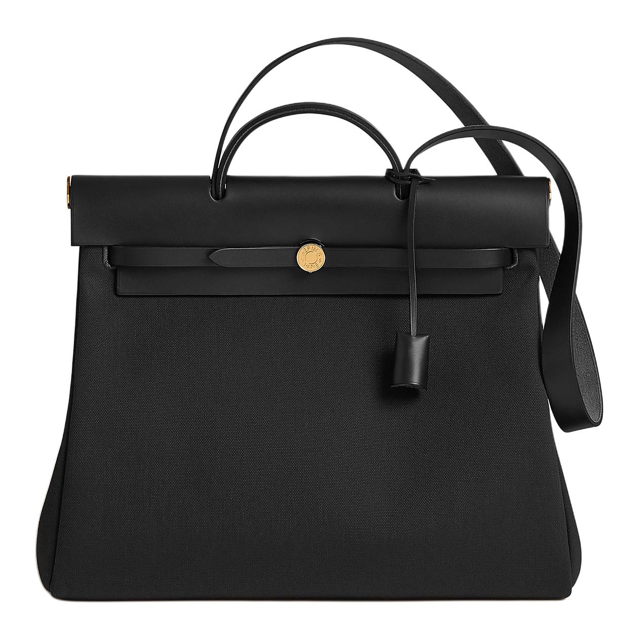 HERMES Сумка через плечо мужская на молнии из холста с кожаными деталями черная 
HERMES Сумка через плечо мужская на молнии из холста с кожаными деталями черная