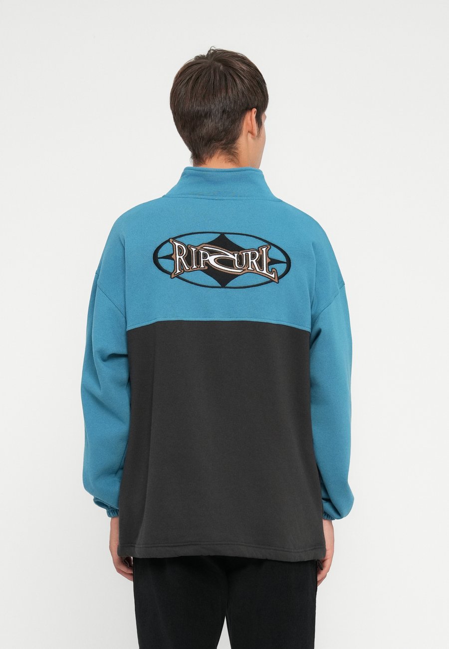 Джемпер Rip Curl HERITAGE OVAL ZIP, Storm Blue/Blue
Джемпер Rip Curl HERITAGE OVAL ZIP, Storm Blue/Blue