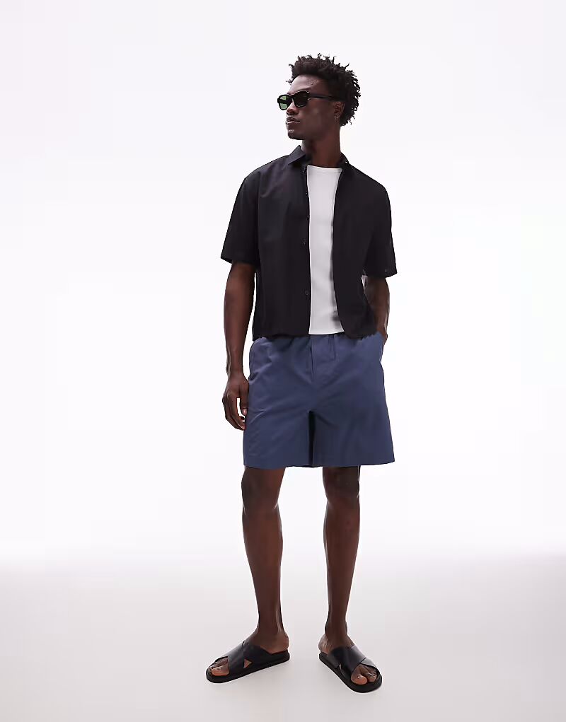 Хлопковые шорты ARKET синего цвета
Хлопковые шорты ARKET синего цвета