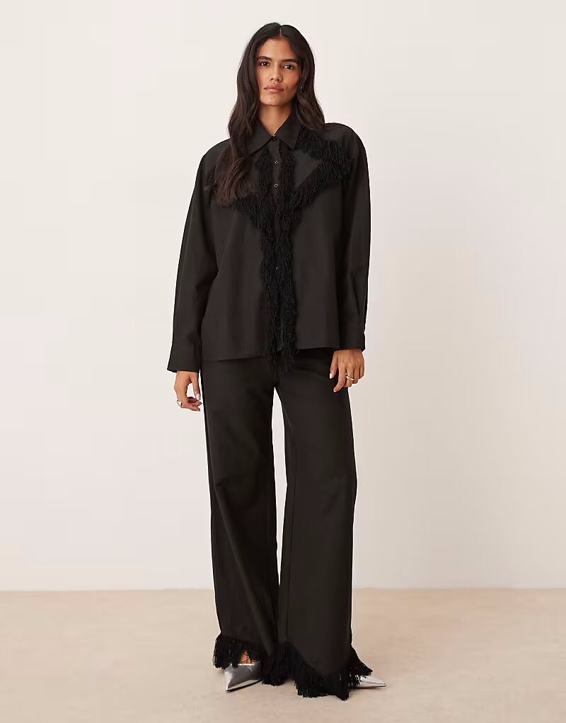 Брюки Georgie с бахромой черного цвета Ghospell
Брюки Georgie с бахромой черного цвета Ghospell