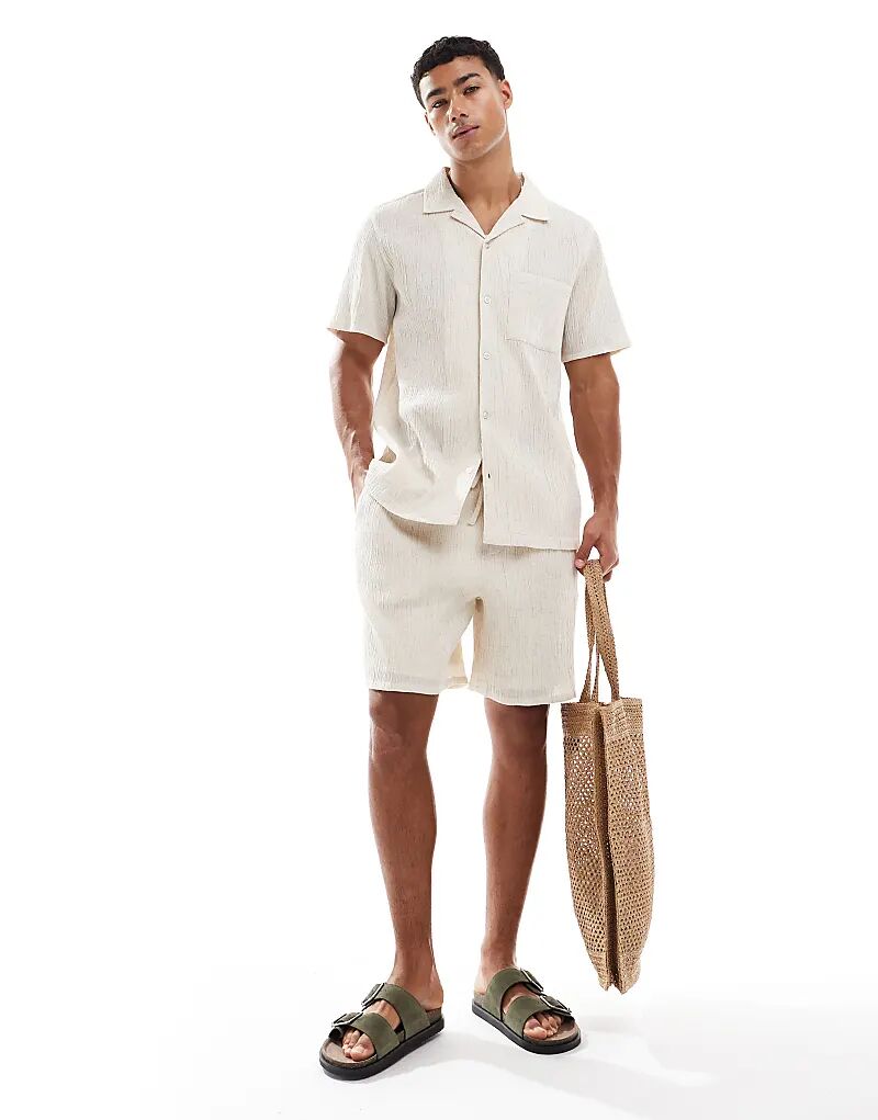 Комбинируемая рубашка New Look с мятым узором в оттенке белого
Комбинируемая рубашка New Look с мятым узором в оттенке белого